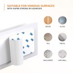 amazon basics Wall Mounted Mobile Holder Storage Case for Phones with Strong Adhesive Strips,Wall Mount Mobile Stand/Multi Purpose Stand with Hole for Phone Charging (White) - Image 2